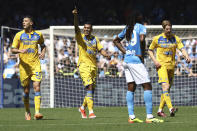 Frosinone's Walid Cheddira, center, celebrates after scoring his side's second goal during a Serie A soccer match between Napoli and Frosinone at the Diego Armando Maradona Stadium in Naples, Italy, Sunday, April 14, 2024. (Alessandro Garofalo/LaPresse via AP)