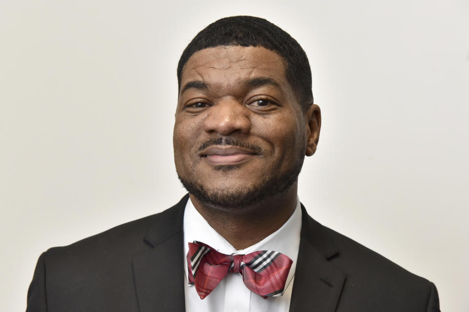 In this Feb. 13, 2020, photo, T.J. Smith, one of the candidates running for mayor of Baltimore City in the Democratic primary, poses for a picture, in Baltimore. (Amy Davis/The Baltimore Sun via AP)