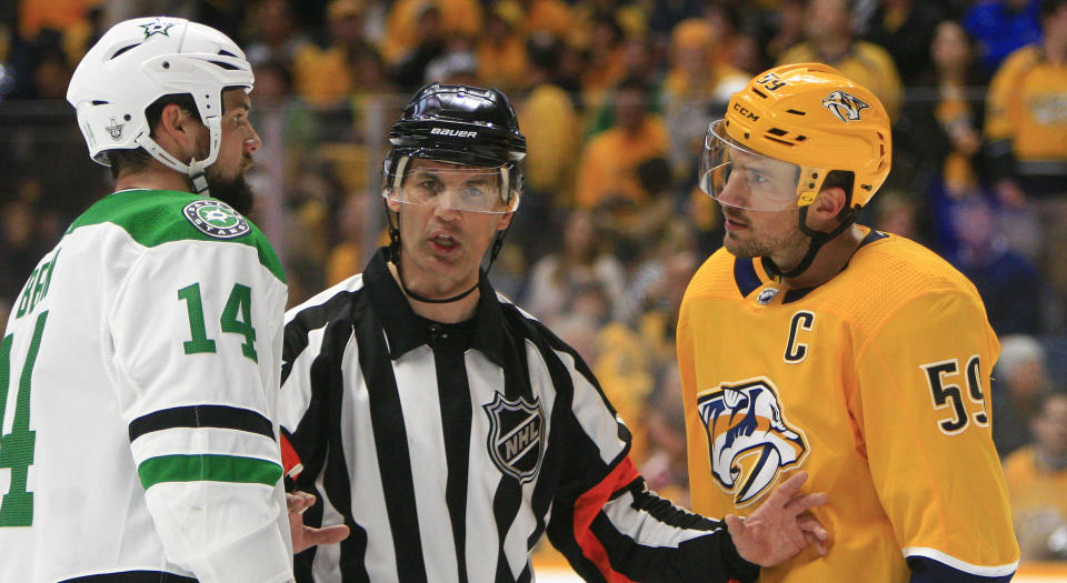 Referee Wes McCauley talks with Dallas’ Jamie Benn and Nashville’s Roman Josi during Game 5 of their first round matchup on Saturday. (Photo by Danny Murphy/Icon Sportswire via Getty Images)