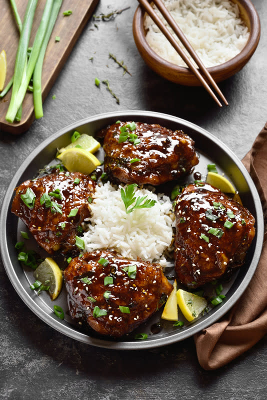 <p>Miss Homemade</p><p>Sticky, spicy and sweet—you will love these Asian-inspired chicken thighs. The great thing about them is they are so easy to prepare. Serve with white rice and you have a meal that will be requested often.</p><p><strong>Get the recipe: <a href="https://www.misshomemade.com/asianchickenthighs.html" rel="nofollow noopener" target="_blank" data-ylk="slk:Asian Chicken Thighs;elm:context_link;itc:0;sec:content-canvas" class="link rapid-noclick-resp">Asian Chicken Thighs</a></strong></p>