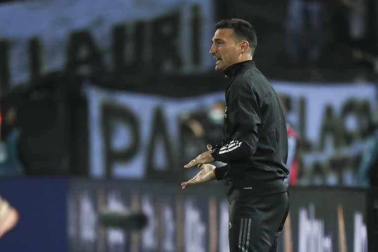 Argentina's coach Lionel Scaloni stands on the sidelines during a qualifying soccer match against Uruguay for the FIFA World Cup Qatar 2022 in Montevideo, Uruguay, Friday, Nov. 12, 2021. (Raúl Martínez/Pool Via AP)