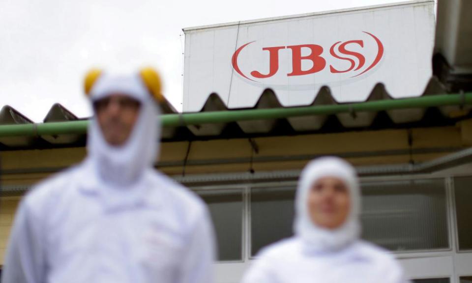 Employees are seen at the Brazilian meatpacker JBS SA in the city of Lapa, Parana state, Brazil, 21 March 21 2017.