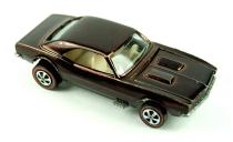 <p>There is no shortage of Hot Wheels based on the Chevrolet Camaro, which was issued in numerous forms since its introduction as one of the original Sweet Sixteen cars. This brown-over-white version is one of the rarest, and some collectors claim it was only ever used for store display purposes. </p>