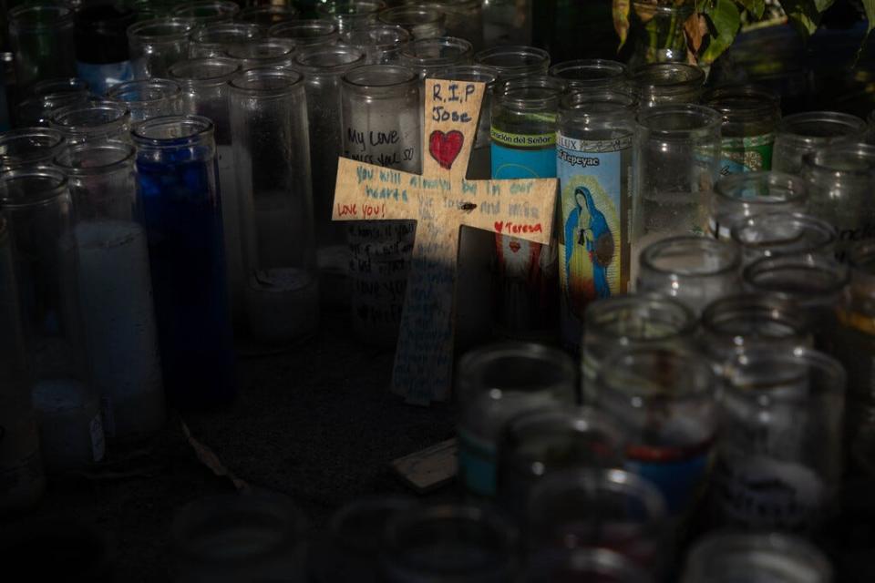 Outside the Wilmington Recreation Center, a memorial to Jose grew. One of the candles was signed, "I love you! Wifey."
