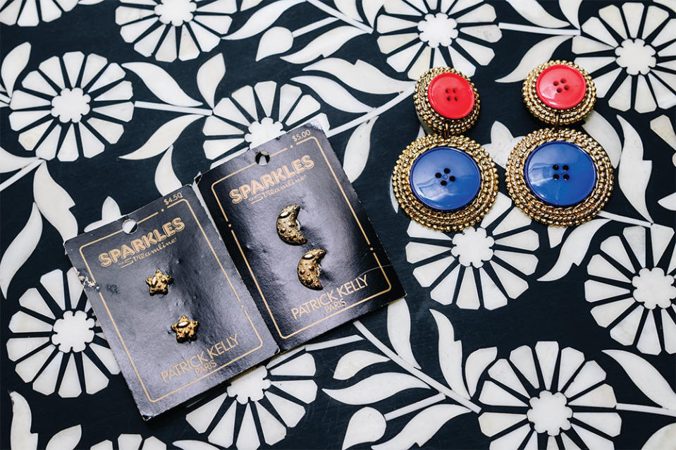 Her collection includes Patrick Kelly buttons and earrings made from buttons by the designer.