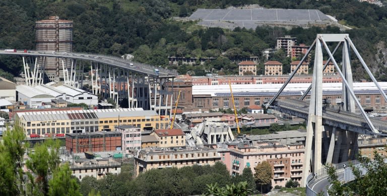 Abandoned vehicles on the Morandi motorway bridge which collapsed in the north-western Italian city of Genoa, claiming at least 39 lives