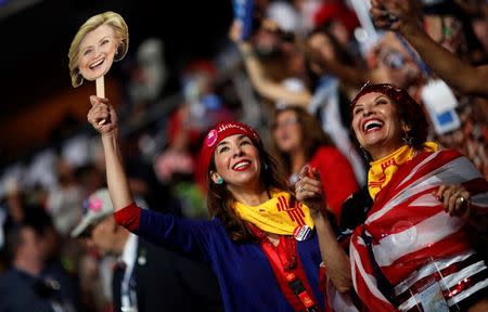 Supporters of Hillary cheer on the convention floor. REUTERS/Carlos Barria