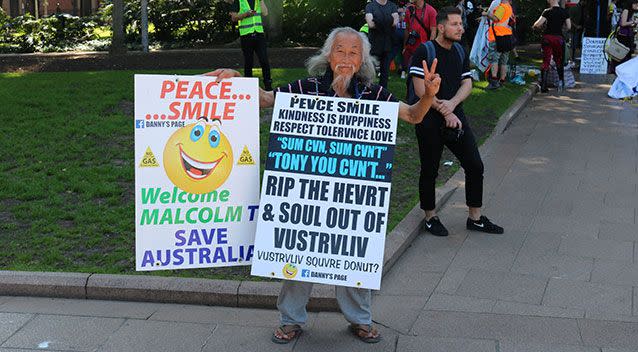 Sandwich board activist Danny Lim was out to protest the lockout laws. Source: Nicholas McCallum