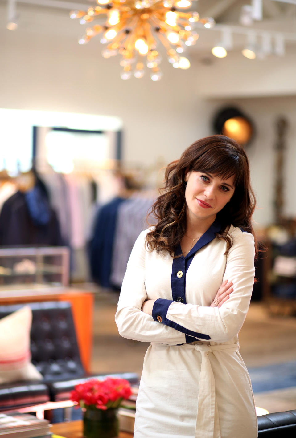 Zooey Deschanel poses for a portrait in Los Angeles on Wednesday, April 9, 2014. Deschanel collaborated with designer Tommy Hilfiger on the "To Tommy, From Zooey" collection. A self-described “fabric nerd” known for her bright blue eyes, long bangs and retro-inspired dresses, Deschanel spent two years collaborating with Hilfiger to create a collection of flirty frocks based on her own personal style. (Photo by Matt Sayles/Invision/AP)