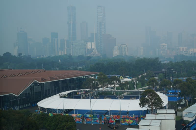 A general view is seen of smoke haze from bushfires at Melbourne Park, venue of the Australian Open practice sessions, in Melbourne