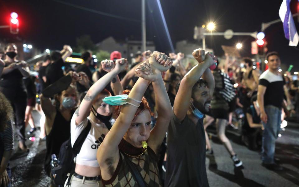 Anti-Netanyahu protest in Jerusalem, Israe - Abir Sultan/Shutterstock