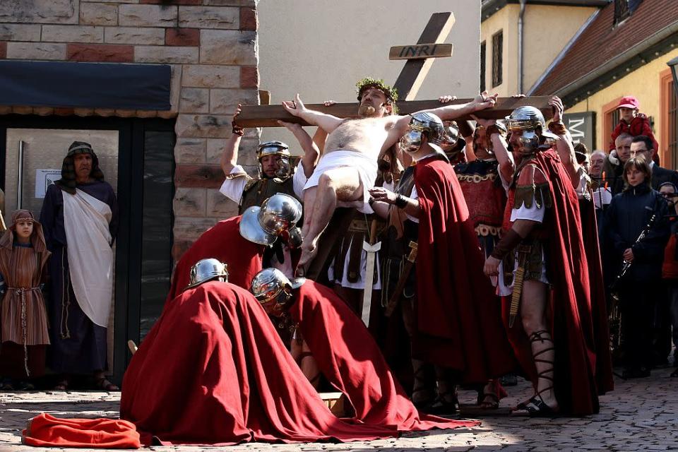 Actors take part in a re-enactment of the crucifixion of Jesus by the Romans on Good Friday 2010 in Bensheim, Germany.