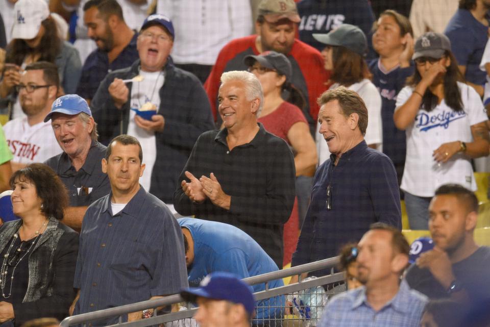 Cranston and John O'Hurley take in a Dodger game in 2016