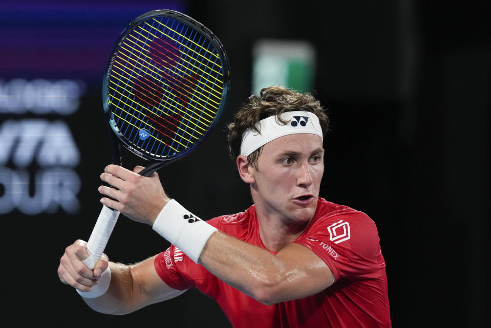 Norway's Casper Ruud plays a forehand return to Adrian Mannarino of France during their United Cup quarterfinal tennis match in Sydney, Australia, Thursday, Jan. 4, 2024. (AP Photo/Mark Baker)