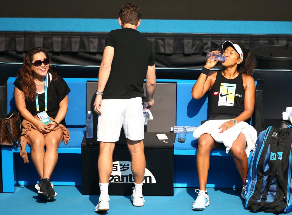 Naomi Osaka sits alongside her mother Tamaki Osaka at the 2020 Australian open.