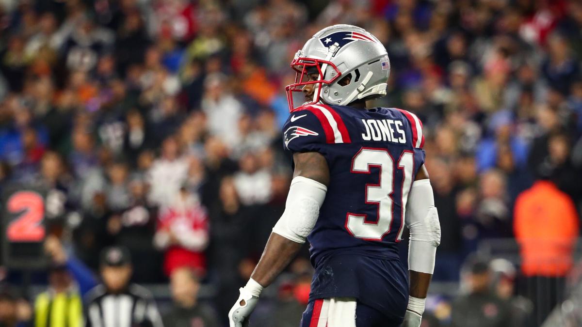 New England Patriots defensive back Jonathan Jones (31) walks back to the  locker room at the end of the second quarter during an NFL football game  against the Miami Dolphins Sunday, Sept.