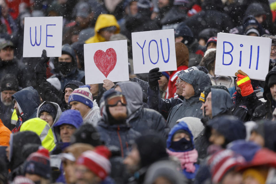 Fans show their support of New England Patriots head coach Bill Belichick during the first half of an NFL football game against the New York Jets, Sunday, Jan. 7, 2024, in Foxborough, Mass. (AP Photo/Michael Dwyer)