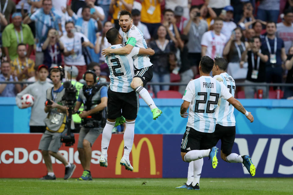 Team work: Messi and Mercado come together as Argentina go ahead