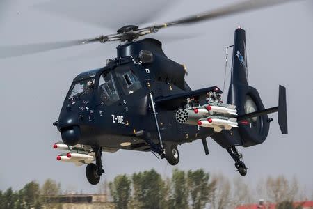 Chinese-developed attack helicopter Z-19E is pictured during its maiden flight in Harbin, Heilongjiang province, China May 18, 2017. China Daily/via REUTERS