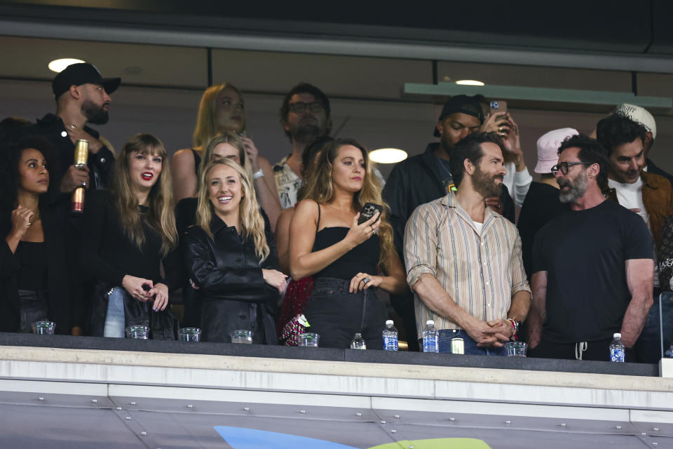 EAST RUTHERFORD, NJ - OCTOBER 1: Taylor Swift, Brittany Mahomes, Blake Lively, Hugh Jackman, and Ryan Reynolds watch from the stands during an NFL football game between the New York Jets and the Kansas City Chiefs at MetLife Stadium on October 1, 2023 in East Rutherford, New Jersey. (Photo by Kevin Sabitus/Getty Images)