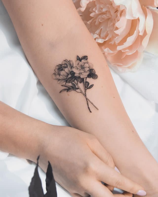 4) This Floral Capricorn Tattoo