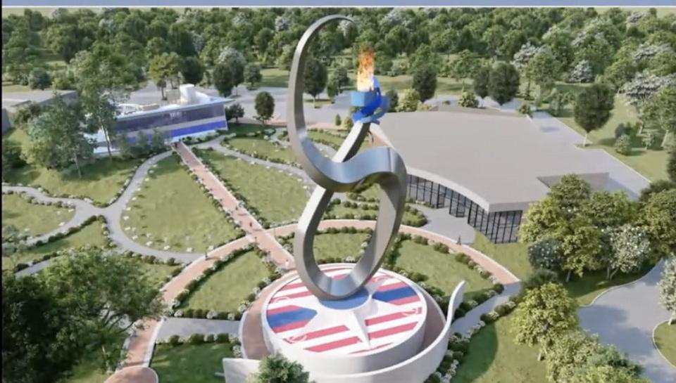 This artist's rendering shows three major components of the proposed $55 million expansion of American Police Hall of Fame & Museum complex in Titusville. They include a 120-foot tall eternal flame monument; a welcome center, at top left; and a 20,000-square-foot convention center with a capacity of 1,000, at top right.
