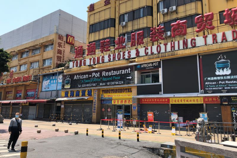 An African restaurant is closed off along with other businesses in Guangzhou's Sanyuanli area, where a neighborhood is in lockdown after several people tested positive for the novel coronavirus disease (COVID-19), in Guangdong