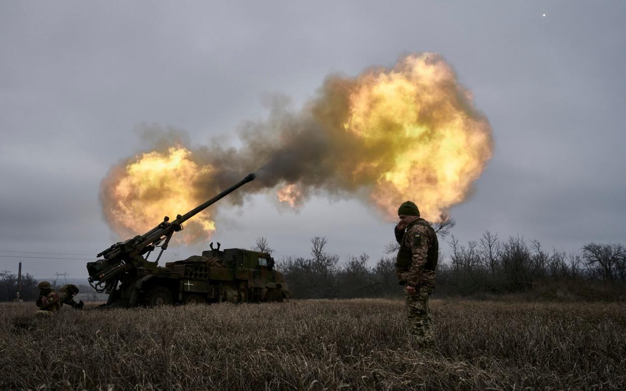 Ukrainian soldiers fire a French-made Caesar self-propelled howitzer towards Russian positions near Avdiivka