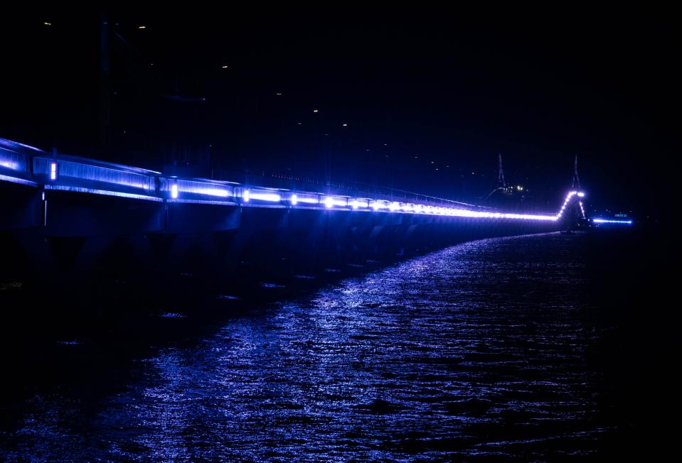 The Pensacola Bay Bridge aglow with LED lights on Thursday, May 4, 2023.