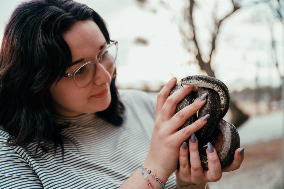 Wofford College student Mae Webster manages the Spartanburg Science Center’s Animal Room. She is a Bonner Scholar and a senior environmental sciences major.