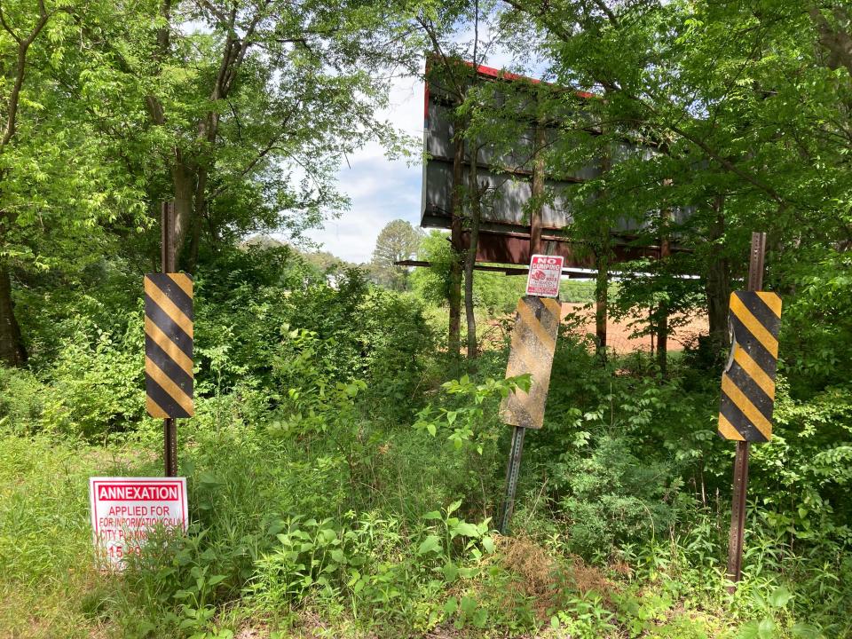 The backside of a billboard sits on a 160-acre farm by Interstate 24. The property won annexation support from the Murfreesboro City Council Thursday, May 2, 2024.
