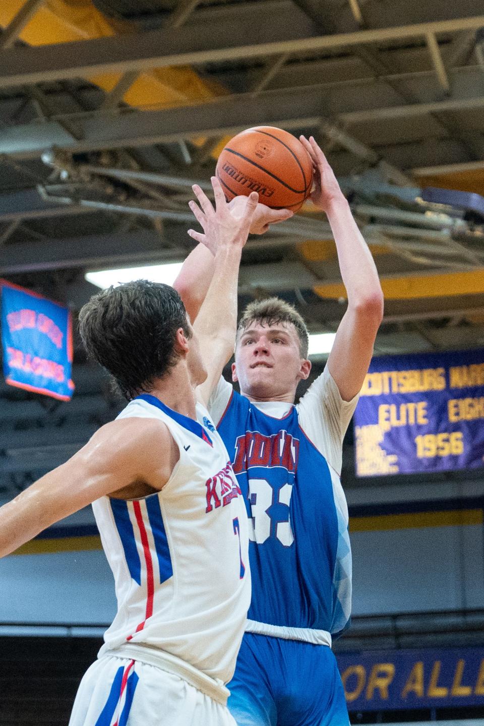 Indiana Junior All-Star Trent Sisley (33) goes for a jump shot against Kentucky Junior All-Star Zander Carter (7) during their game on Sunday, June 2, 2024 in Scottsburg, Ind. at Charles E. Meyer Gymnasium for the first game of the Indiana vs Kentucky All-Stars basketball week.