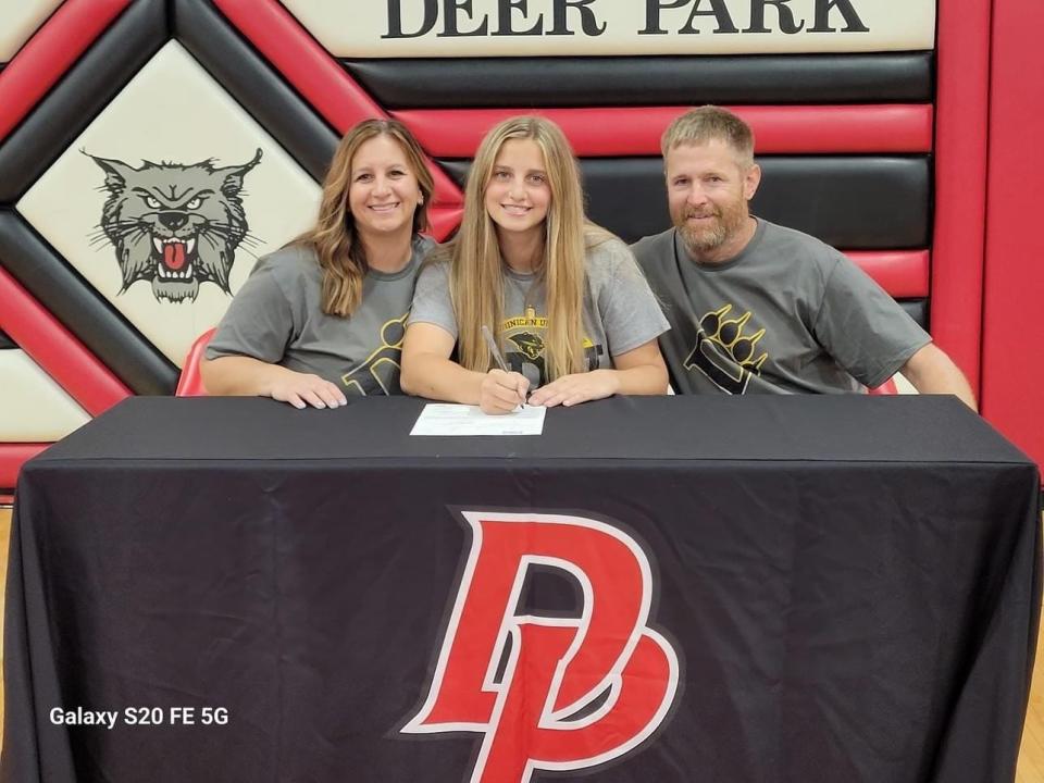 Deer Park's Gina Wilson, along with her parents Stephanie and Gary Wilson, celebrated her signing a letter of intent to play softball for Ohio Dominican Nov. 8, 2023.