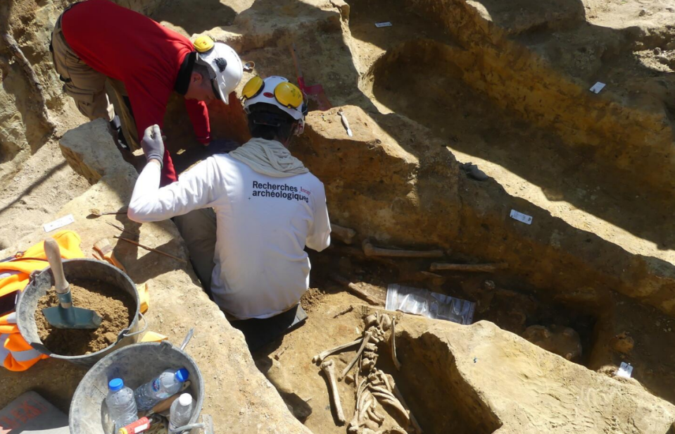 A partial skeleton pictured in one of the graves