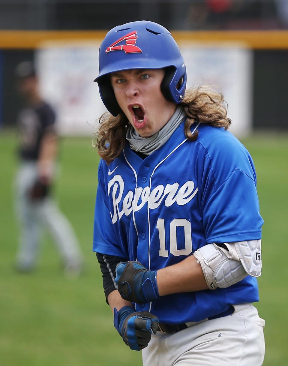 Revere's Dillon Carlquist celebrates after making it to first on a bunt during the fourth inning of a Division II district semifinal against Beachwood on May 24, 2021.