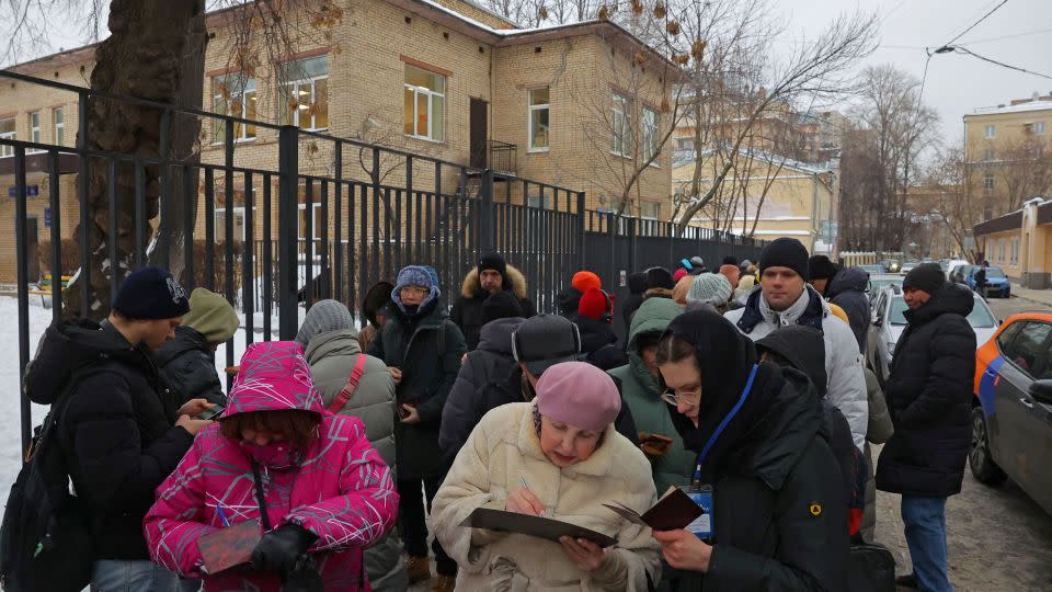 People give their signatures in support of Boris Nadezhdin, who plans to run for Russian president in the March 2024 election, outside his campaign office in Moscow on January 23. - Evgenia Novozhenina/Reuters