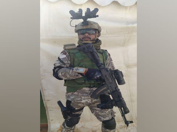 A CRPF commando wearing four-eyed night vision goggles