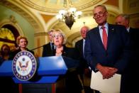Senator Patty Murray (D-WA), flanked by Senate Minority Leader Chuck Schumer (D-NY), speaks to reporters on following a policy luncheon on Capitol Hill in Washington, U.S. October 17, 2017. REUTERS/Eric Thayer