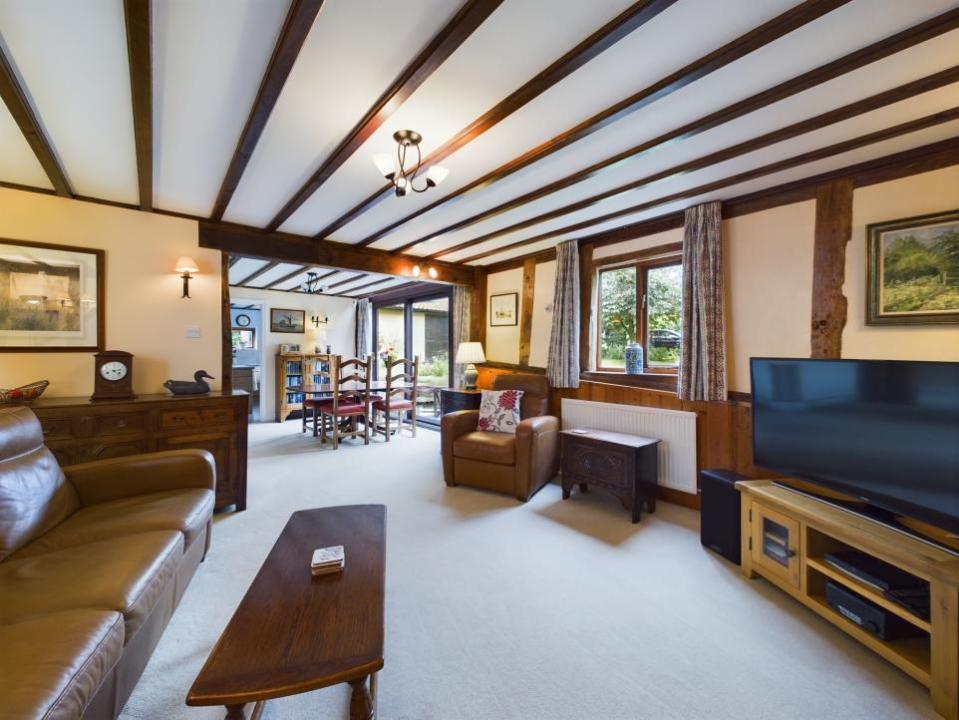 East Anglian Daily Times: The sitting room opens into the dining area, creating an open-plan feel to this space