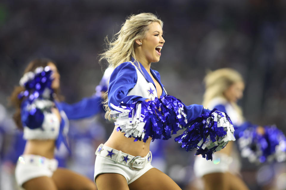 Nov 30, 2023; Arlington, Texas, USA; A Dallas Cowboys cheerleader performs during the second half against the Seattle Seahawks at AT&T Stadium. Mandatory Credit: Tim Heitman-USA TODAY Sports