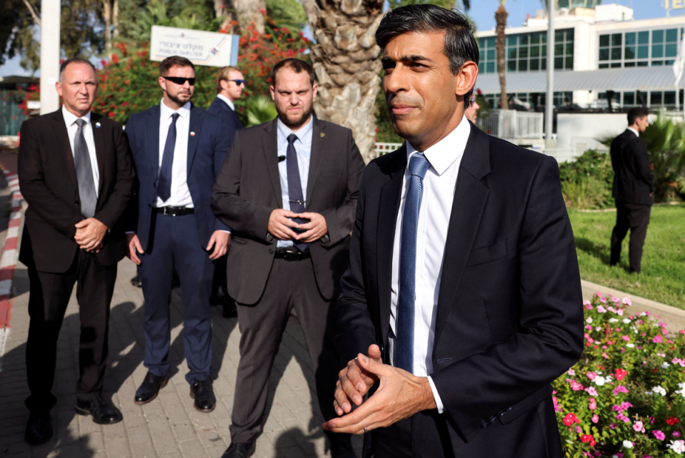 Rishi Sunak speaks to the media after landing at Ben Gurion international airport in Lod, Near Tel Aviv, Israel, on October 19 (REUTERS)