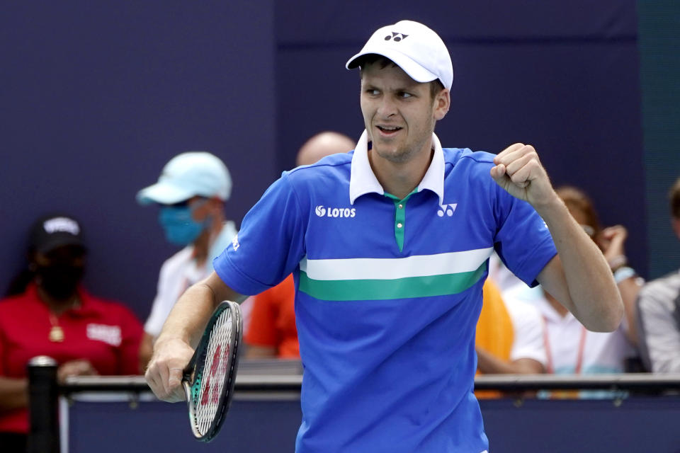 Hubert Hurkacz of Poland reacts after defeating Yannik Sinner of Italy during the finals of the Miami Open tennis tournament, Sunday, April 4, 2021, in Miami Gardens, Fla. Hurkacz won 7-6 (4), 6-4. (AP Photo/Lynne Sladky)