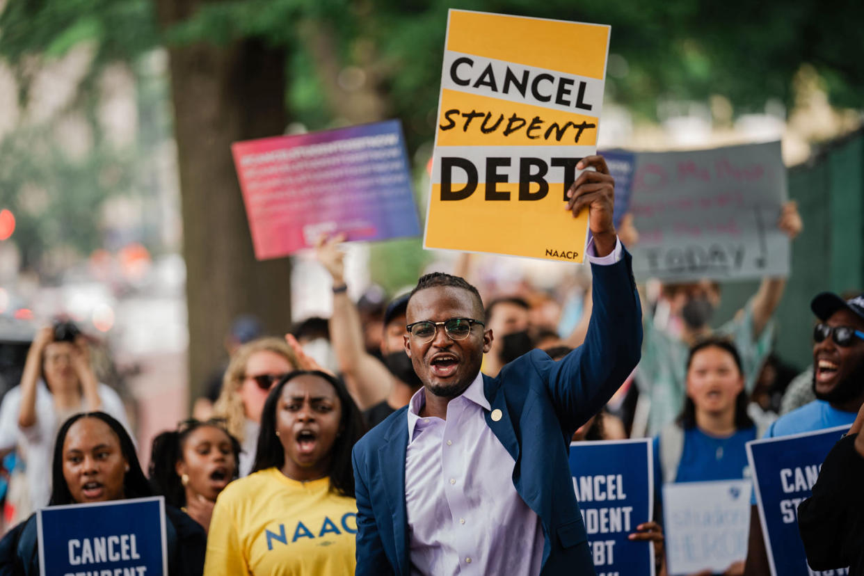 Demonstrators march from the Supreme Court to the White House after the court stuck down President Biden's student debt relief program on June 30, 2023. (Kent Nishimura / Los Angeles Times via Getty Images file)