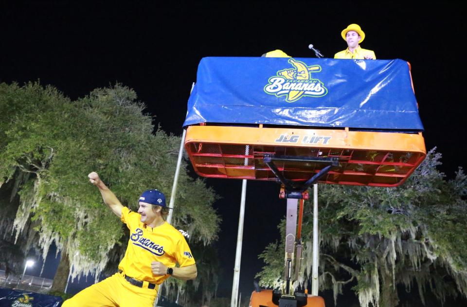 Savannah Bananas owner Jesse Cole watches from a lift as Eric Byrnes dances around after being introduced as the head coach for the Banana Ball team for the 2022 World Tour on Tuesday night at Grayson Stadium.