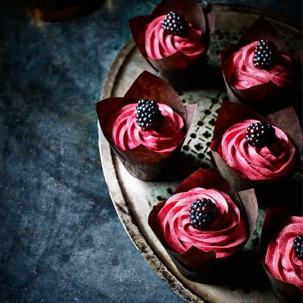 <p>Sweet, sharp and juicy blackberries marry beautifully with gin and a twist of lime in these striking cupcakes.</p><p><strong>Recipe: </strong><a href="https://www.goodhousekeeping.com/uk/food/baking-recipes/blackberry-gimlet-gin-cupcakes" rel="nofollow noopener" target="_blank" data-ylk="slk:Blackberry gin cupcakes;elm:context_link;itc:0;sec:content-canvas" class="link "><strong>Blackberry gin cupcakes</strong></a></p><p><br><br></p>