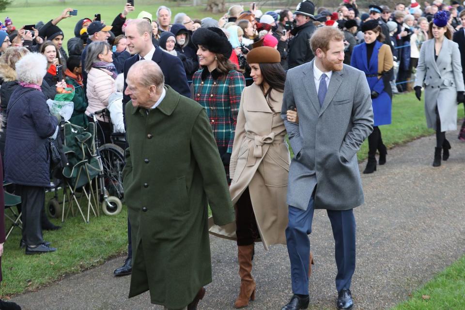 <p>Meghan Markle arrived at Church on Christmas Day wearing a camel wrap coat with tan boots and a matching hat. No word on where her coat is from yet, but we're sure it'll be sold out in seconds anyway!</p>