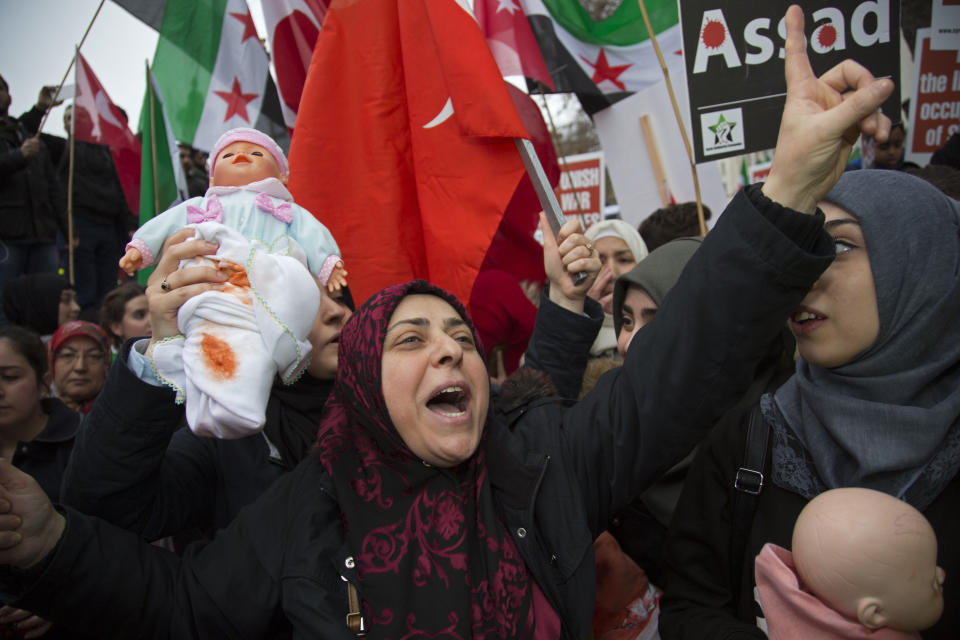 Protesters gather to demonstrate in support of the people of Aleppo. The protest was intended to show anger at the inaction of the international community in the face of catastrophic bombings in Aleppo.&nbsp;