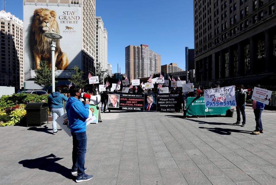 Ramagopal Reddy, of Troy, organizes for a short march from Cadillac Square to the Spirit of Detroit statue on Woodward Avenue in downtown Detroit on Saturday, Sept.19, 2020.