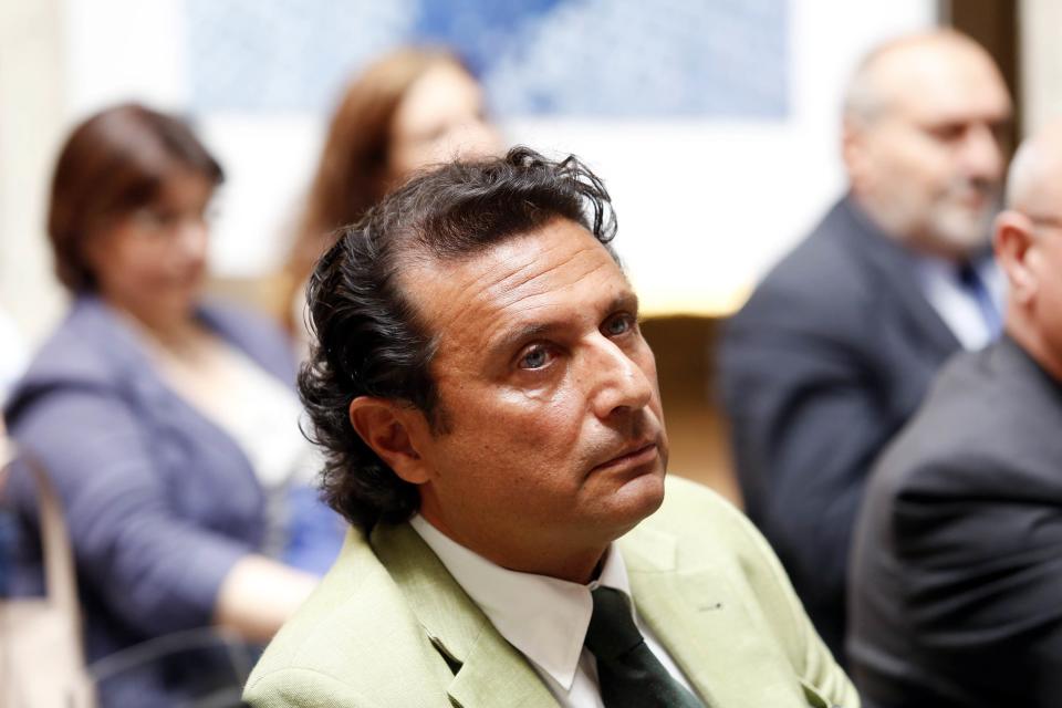 Captain of the capsized Costa Concordia Francesco Schettino attends a meeting in Rome July 10, 2014. (REUTERS/Remo Casilli)