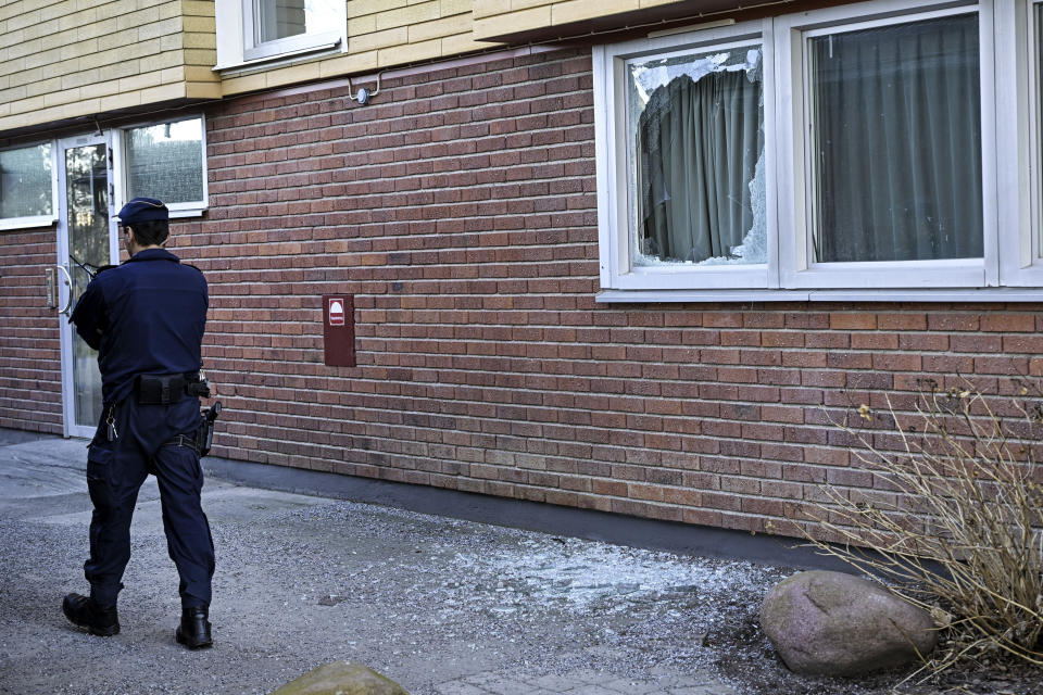 Police on site after an explosion in Tyreso, Sweden, Thursday March 7, 2023. Sweden’s Security Service said Thursday it had arrested four people on suspicion of preparing “terrorist offenses” with links to Islamic extremism and organized crime. Several houses were searched in the operation. (Anders Wiklund/TT via AP)